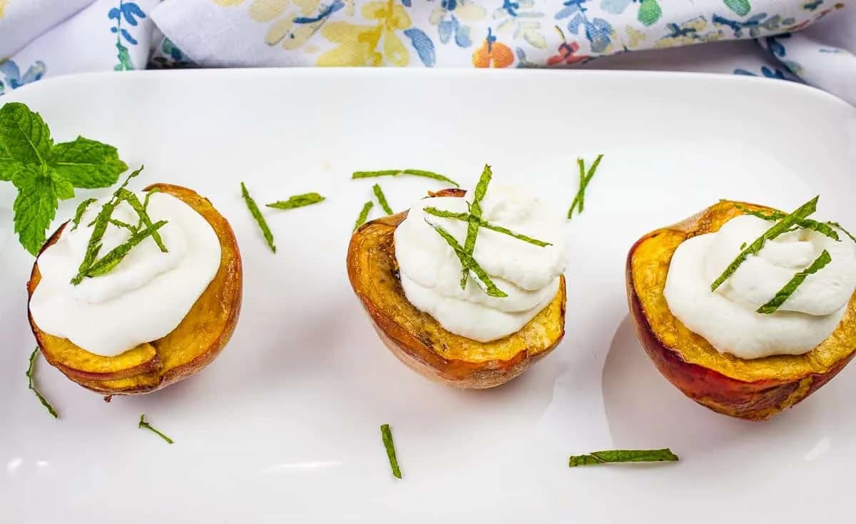 Smoked Peaches with Spiced Rum Whipped Cream