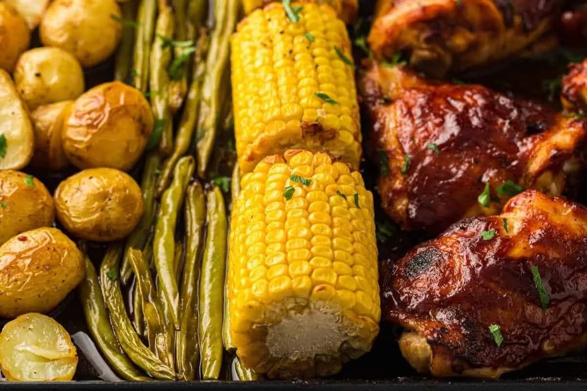 Sheet Pan BBQ Chicken Thighs with Baby Potatoes, Green Beans & Corn
