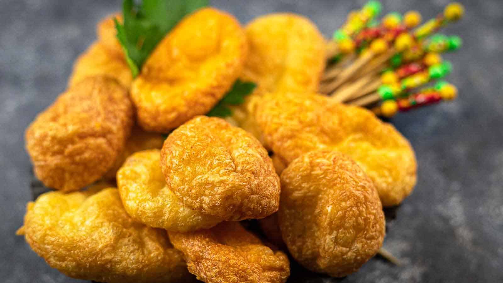 Cheese Puffs in a bowl with fresh parsley.