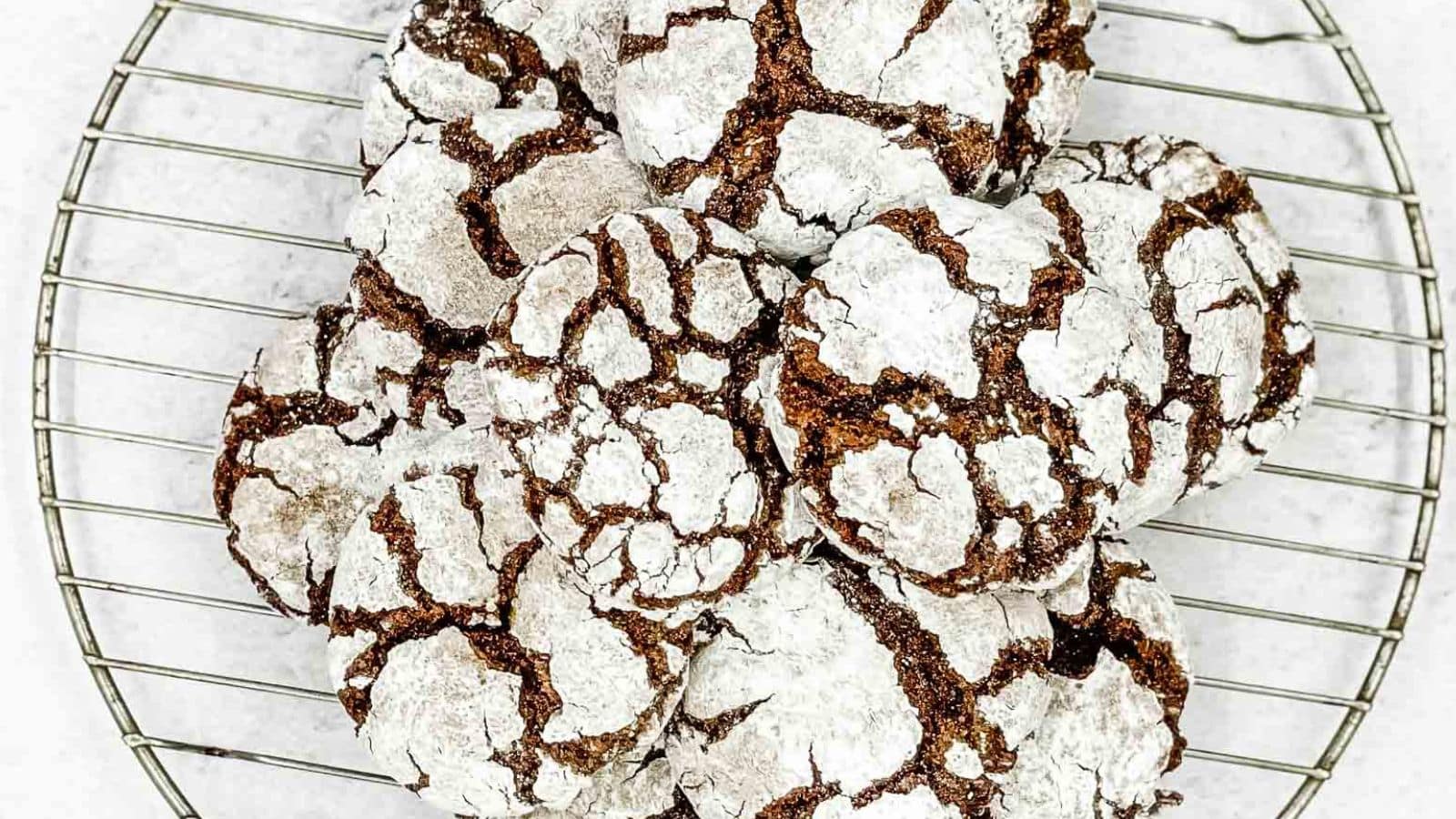 Chocolate crinkle cookies covered in powdered sugar.