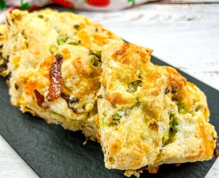 Bacon Cheddar & Green Onion Scones on a stone slate.