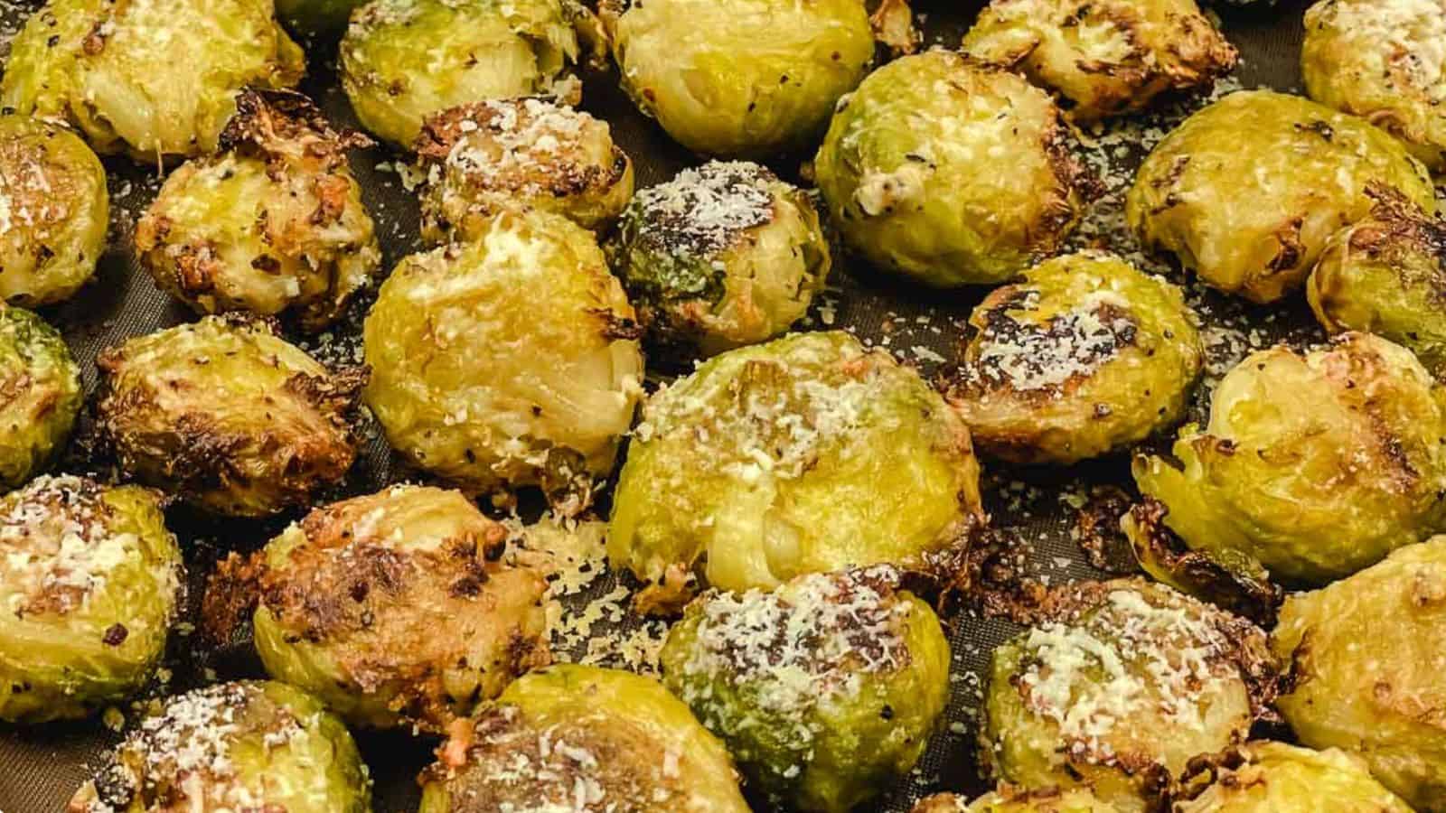 Roasted brussels sprouts on a baking sheet.