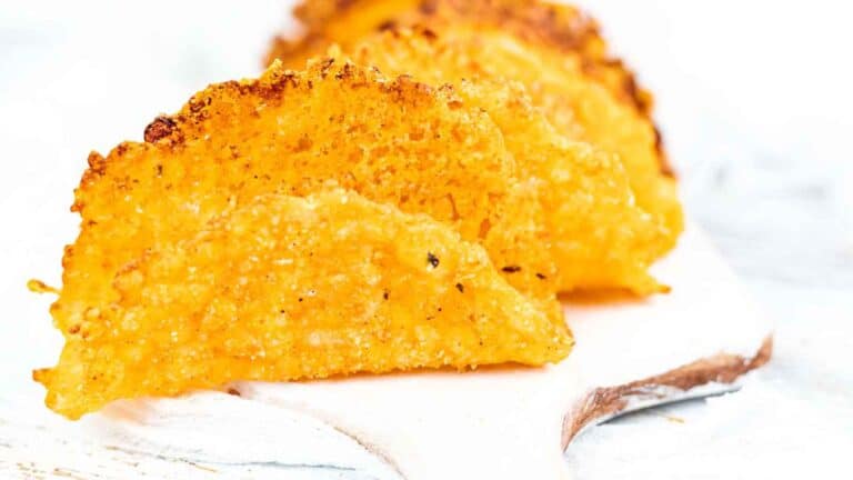 Almond Flour Taco Shells on a white board.