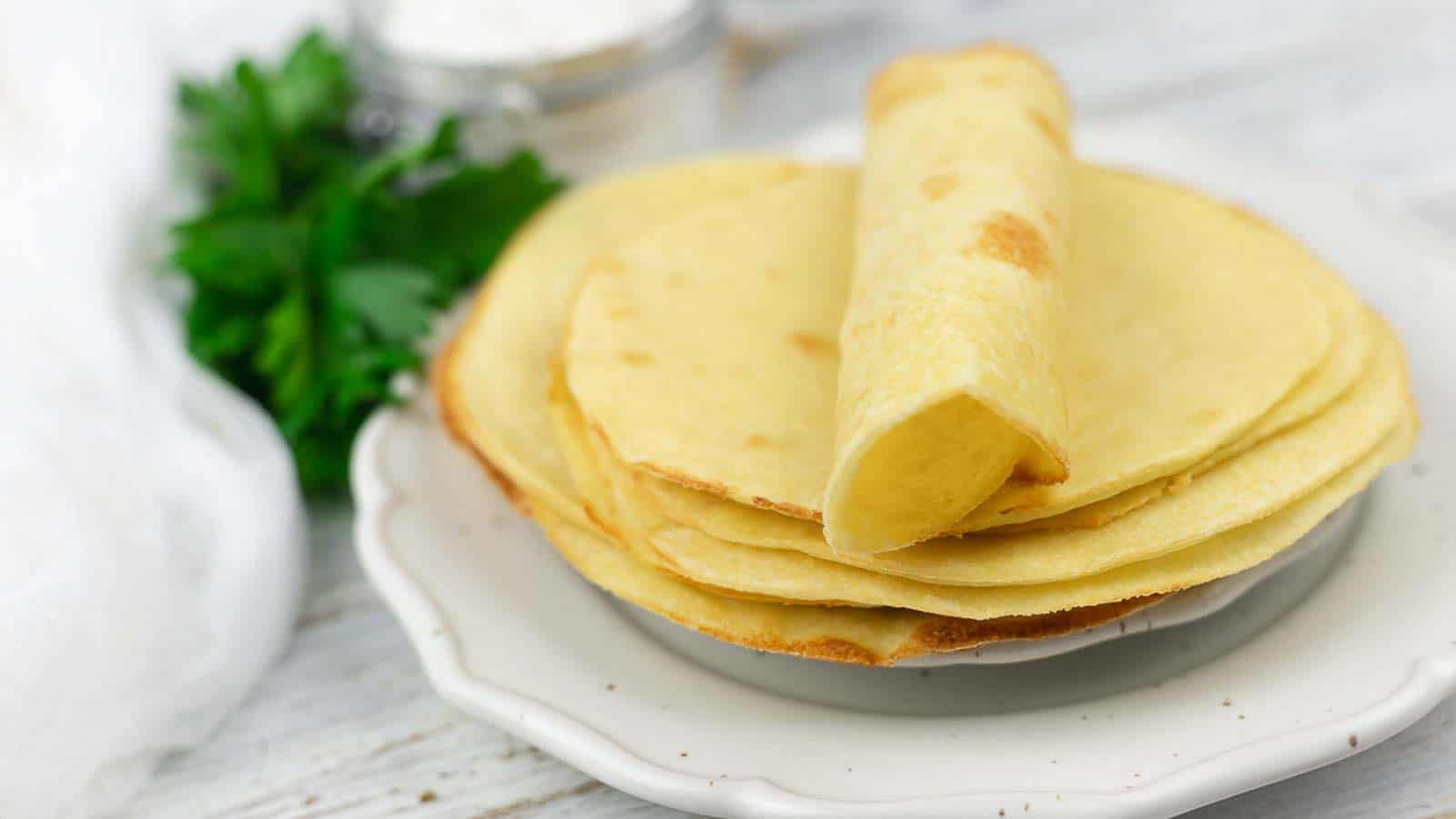 Tortillas spread on a white plate ready to enjoy. 