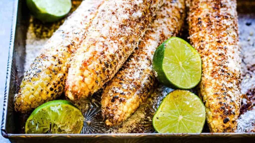 A zesty twist to traditional taco recipes, enjoy corn on the cob topped with lime slices.