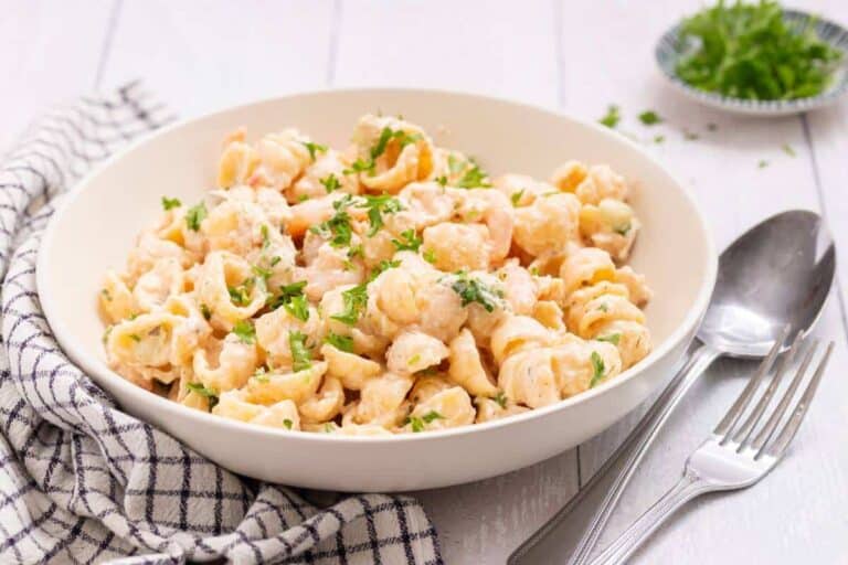 A tempting lunch idea worth taking a break for - a bowl of pasta with shrimp and parsley.