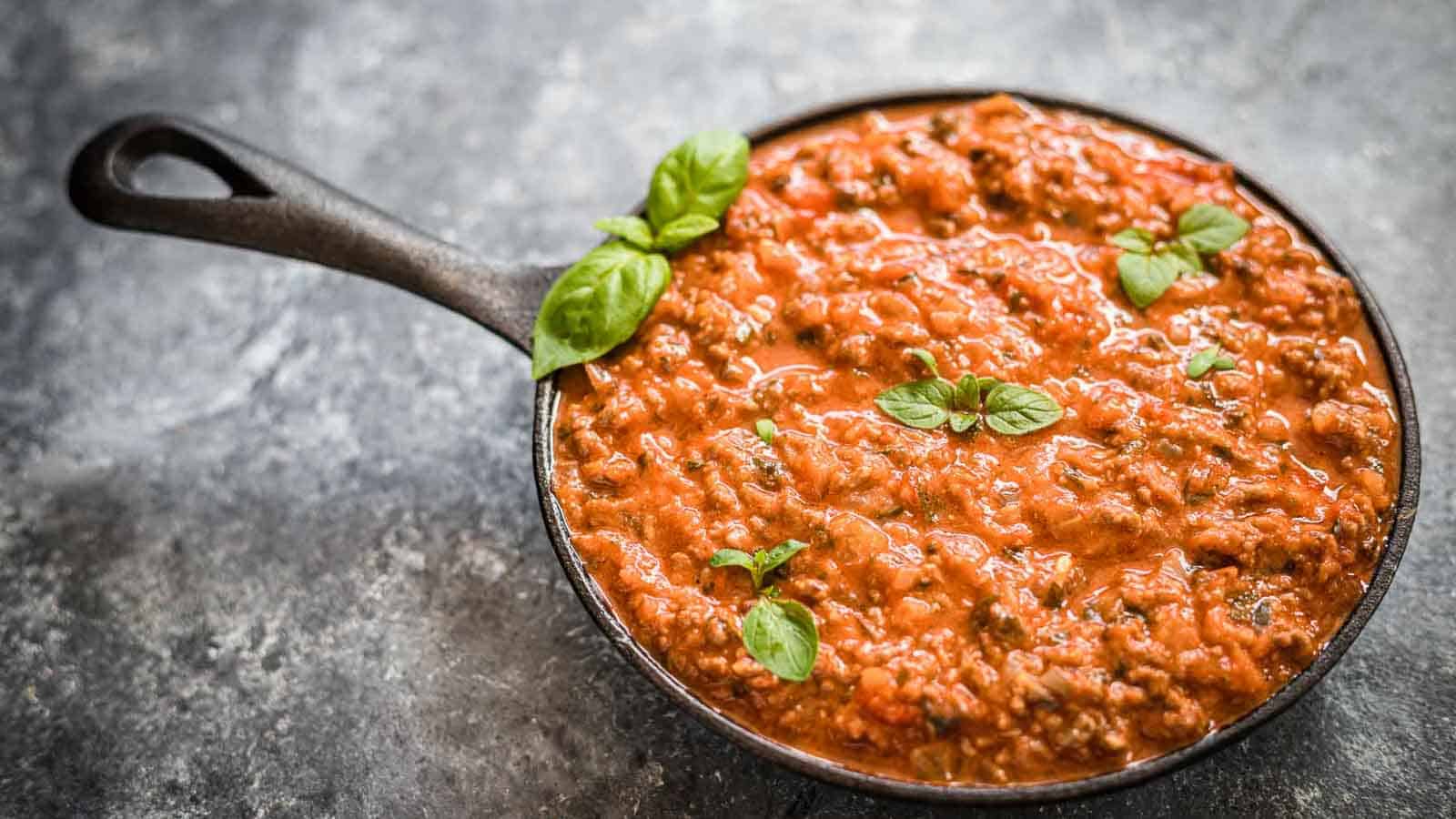 Bolognese sauce in a small cast iron.