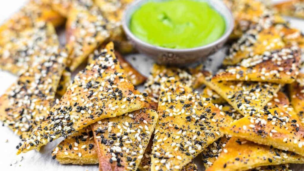 Everything Bagel Keto Crackers with a dip in the middle.