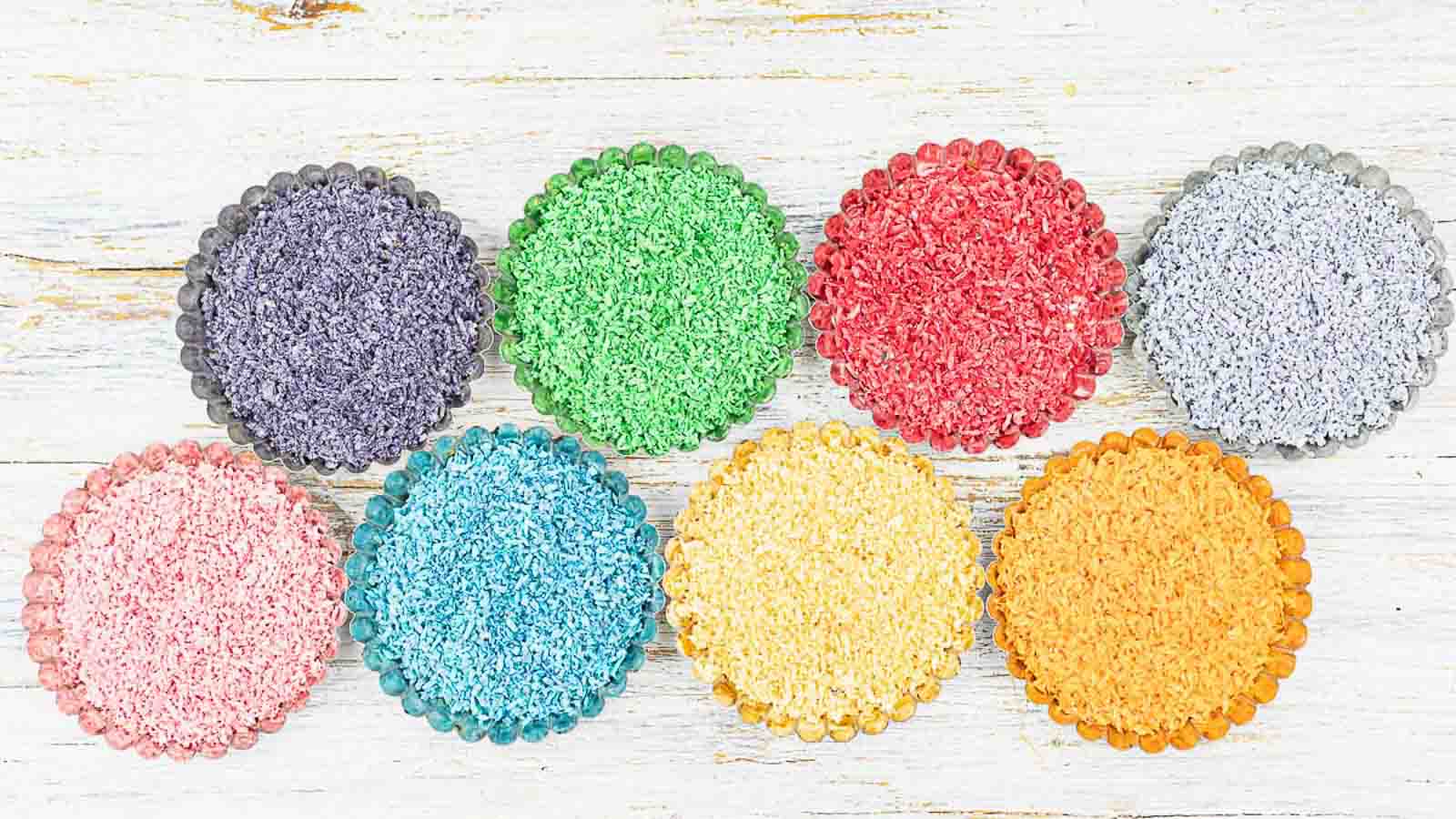 Sugar-Free Sprinkles inside containers in colors. 