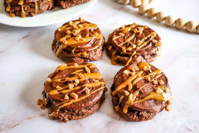 Chocolate peanut butter cookies on a marble table.