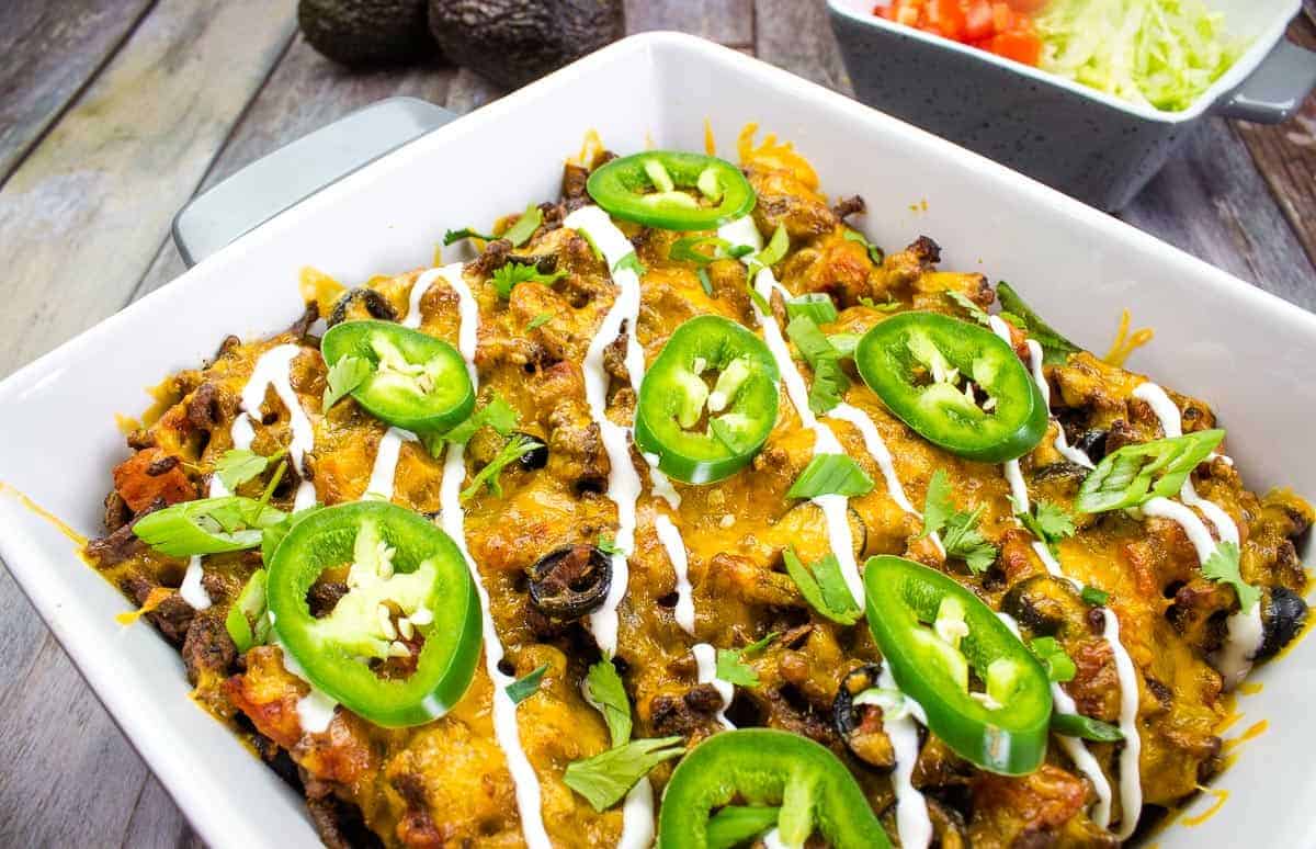 A Taco Casserole dish with black beans, cheese and jalapenos.