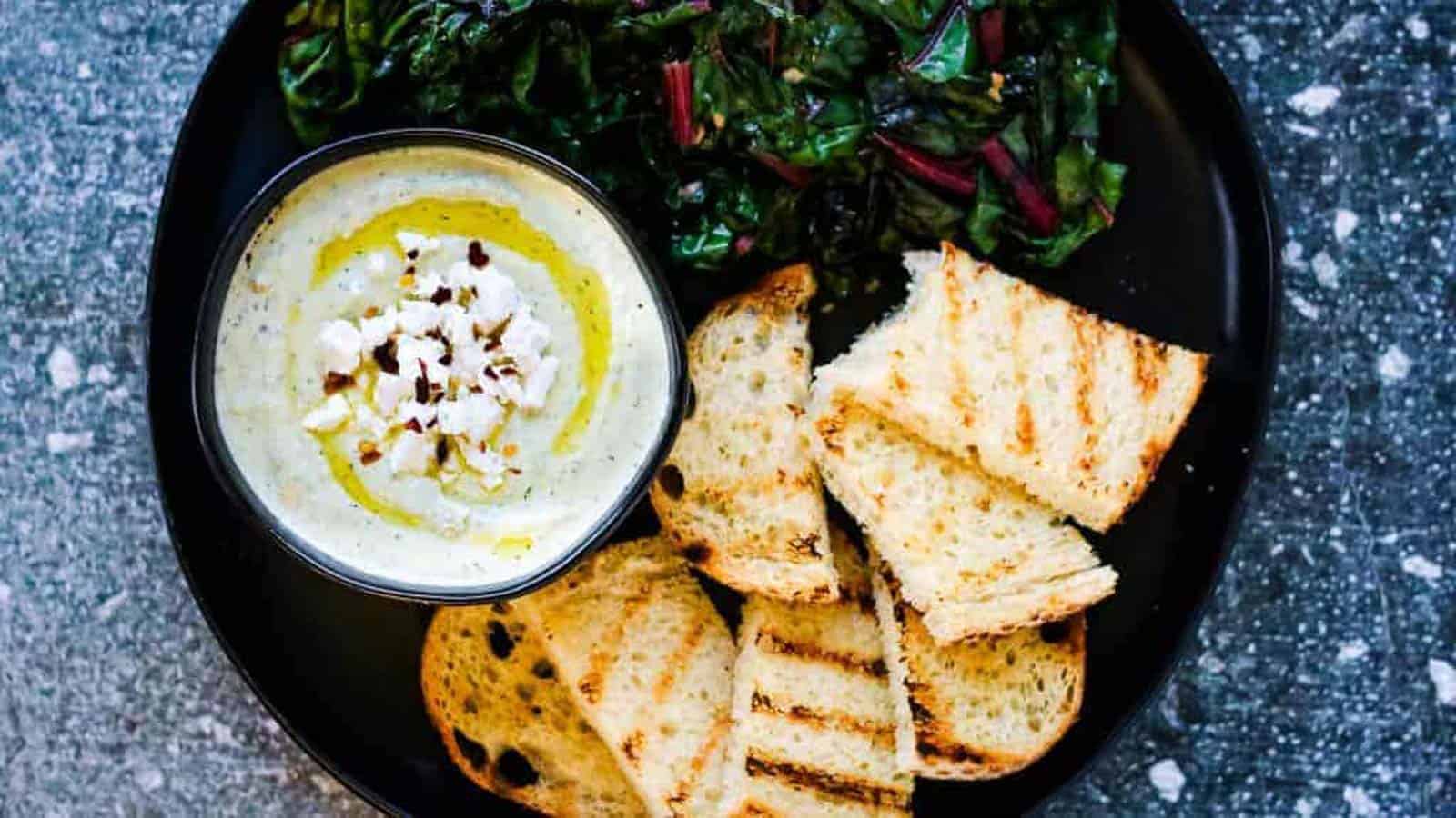 Whipped Feta Spread is a tangy, salty, creamy dip with a punch of garlic and fresh dill. It is delicious scooped up with pita chips or raw veggies.