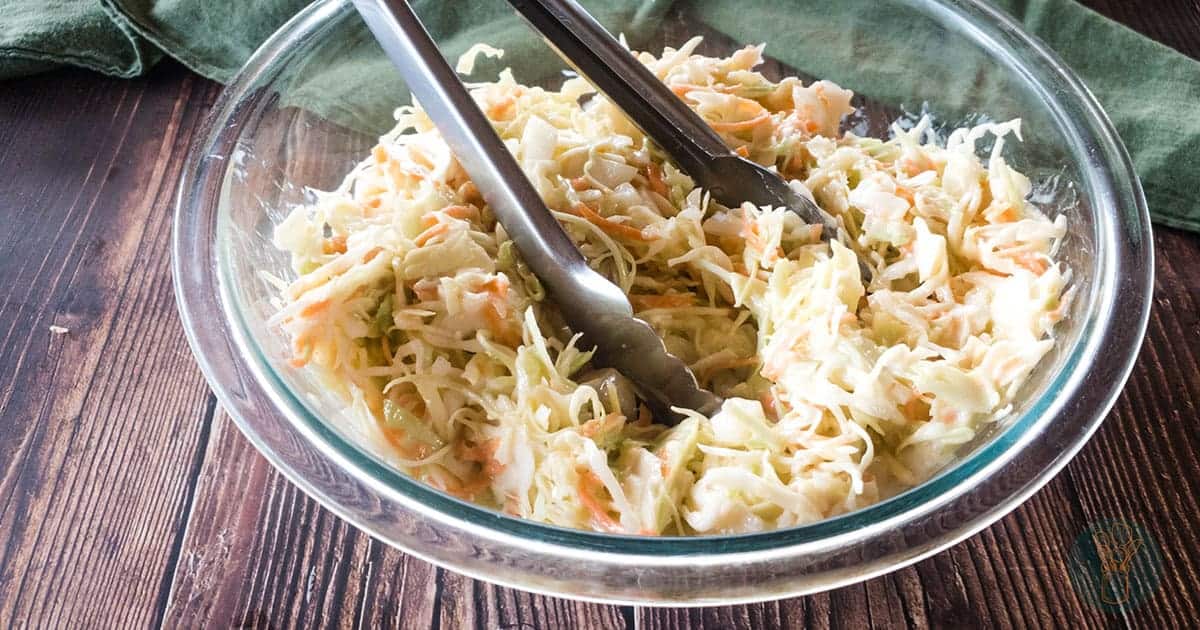 A picture of Popeyes coleslaw copycat recipe in glass bowl.