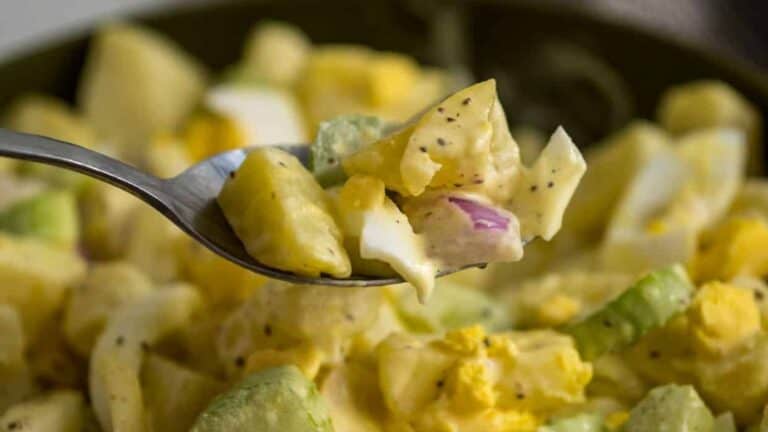 Creamy potato salad with eggs and mayonnaise.