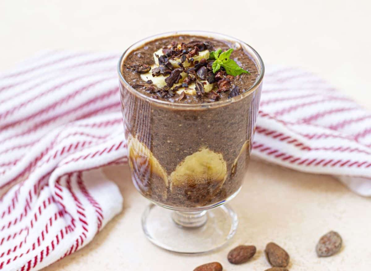 Banana chia seed pudding in a glass.