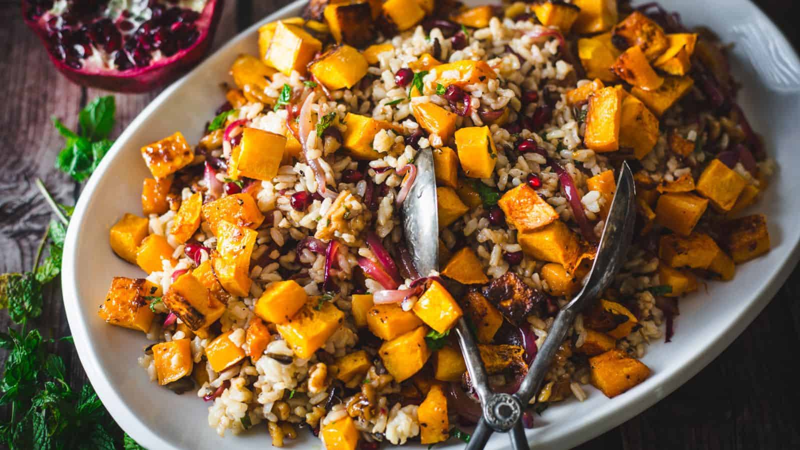 Side view of wild rice pilaf with pomegranate and butternut squash.
