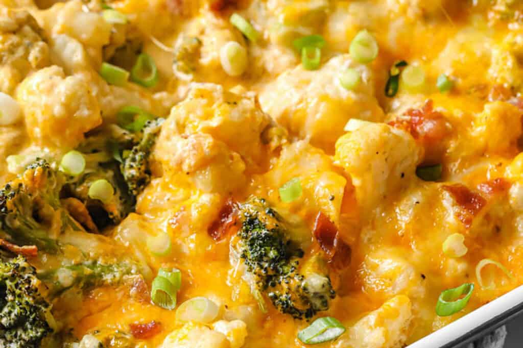 A casserole dish with broccoli and cheese.