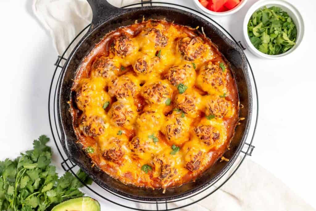 Mexican meatballs in a cheesy sauce, perfect for cozy winter dinners.