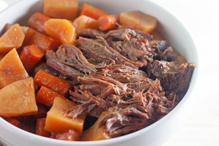 A hearty bowl of beef stew with tender carrots and potatoes, perfect for warm winter dinners.