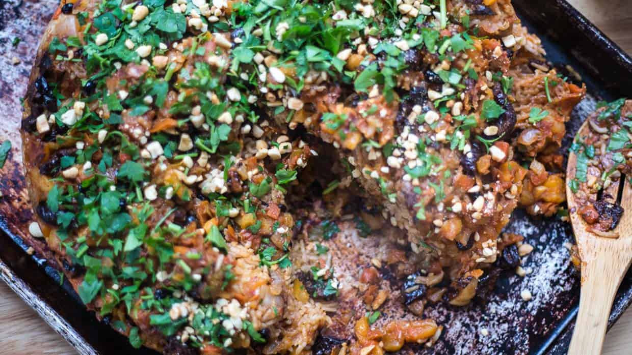 Rice pilaf in copper saucepan.