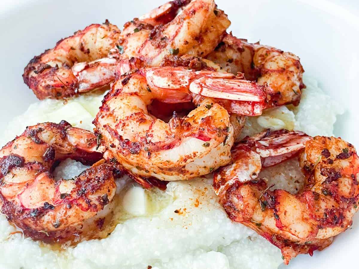 Spicy cajun shrimp on grits.