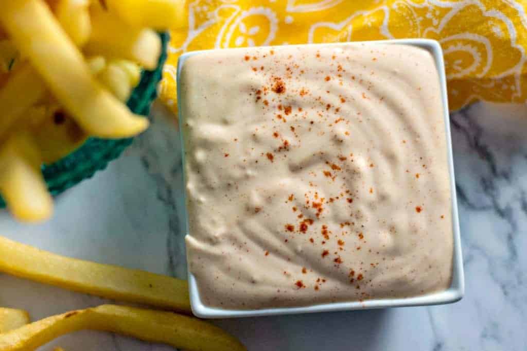 Bowl of homemade fry sauce with French fries.