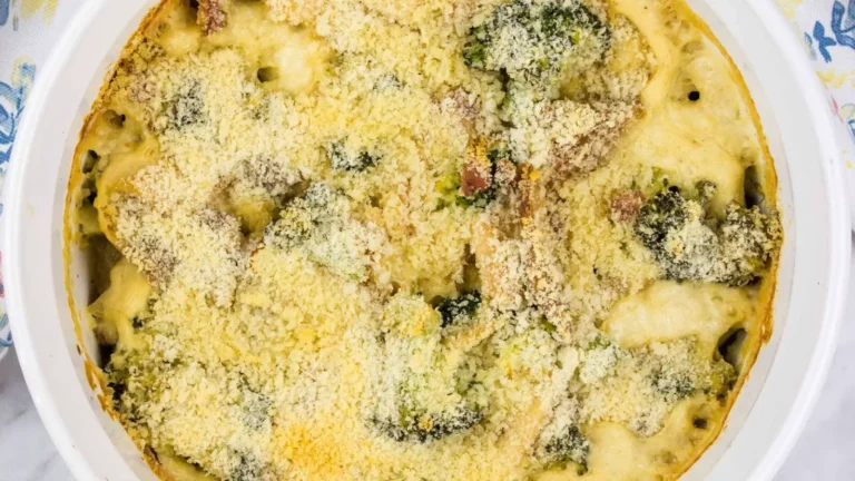 A casserole dish with broccoli and cheese.