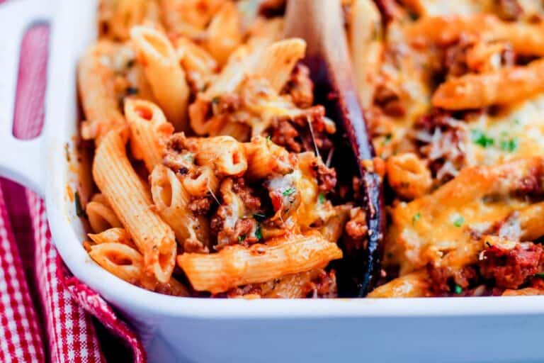 A casserole dish with pasta and meat in it.