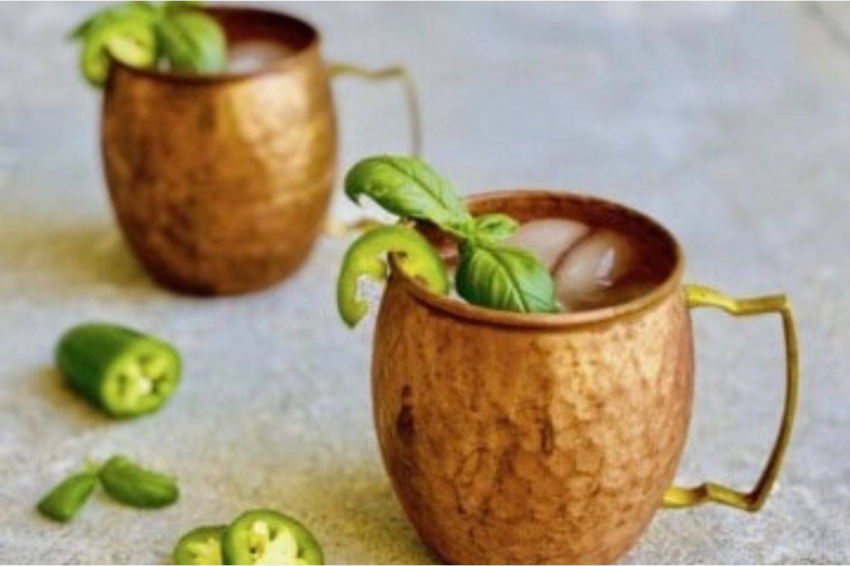 Two copper mugs with Moscow mules.