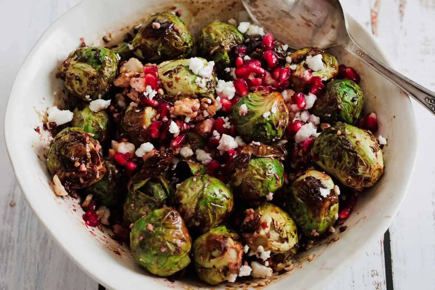Roasted brussels sprouts with pomegranate and goat cheese.