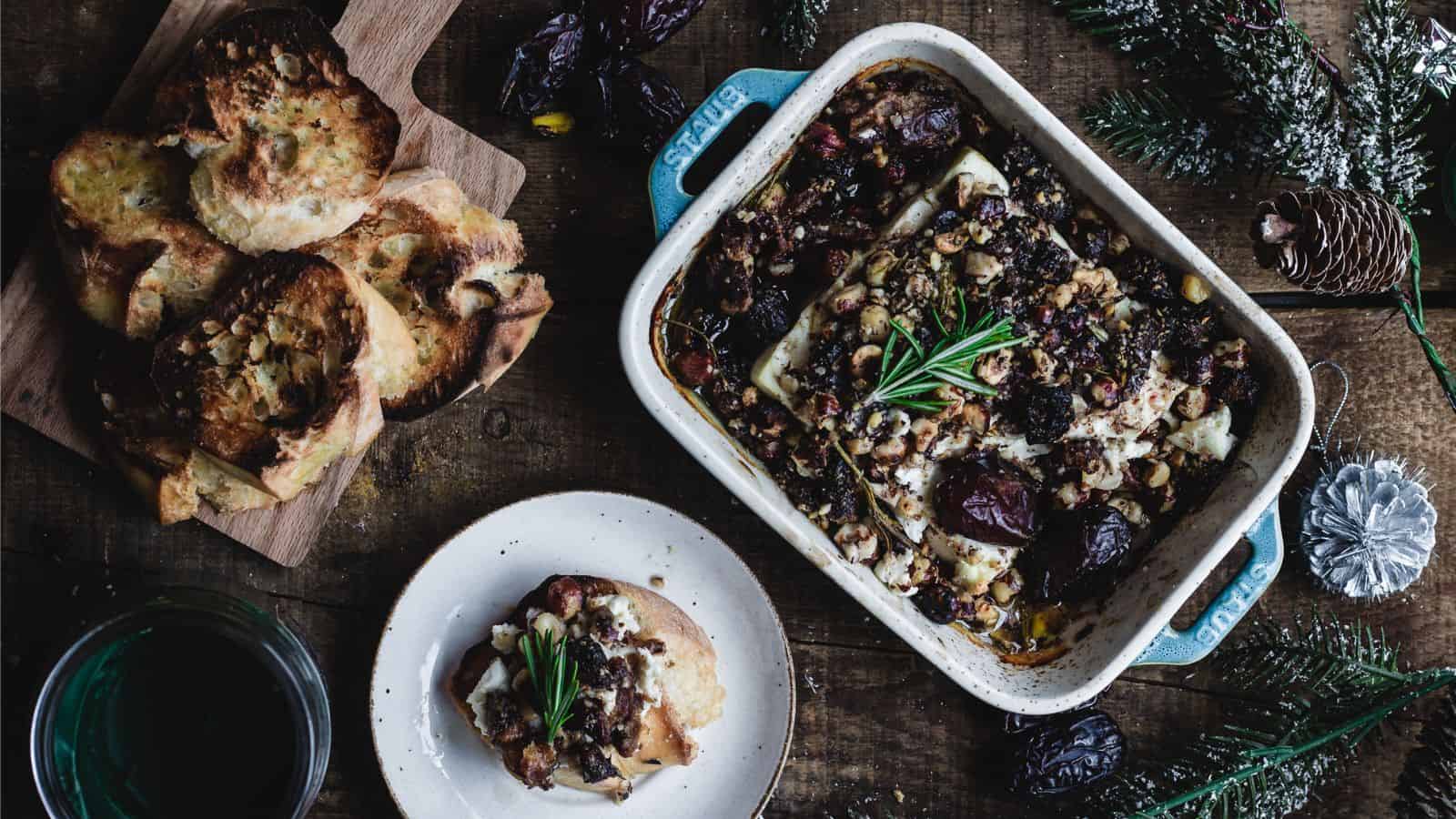 A festive dish of roasted beets and bread on a wooden table, perfect for holiday appetizers.