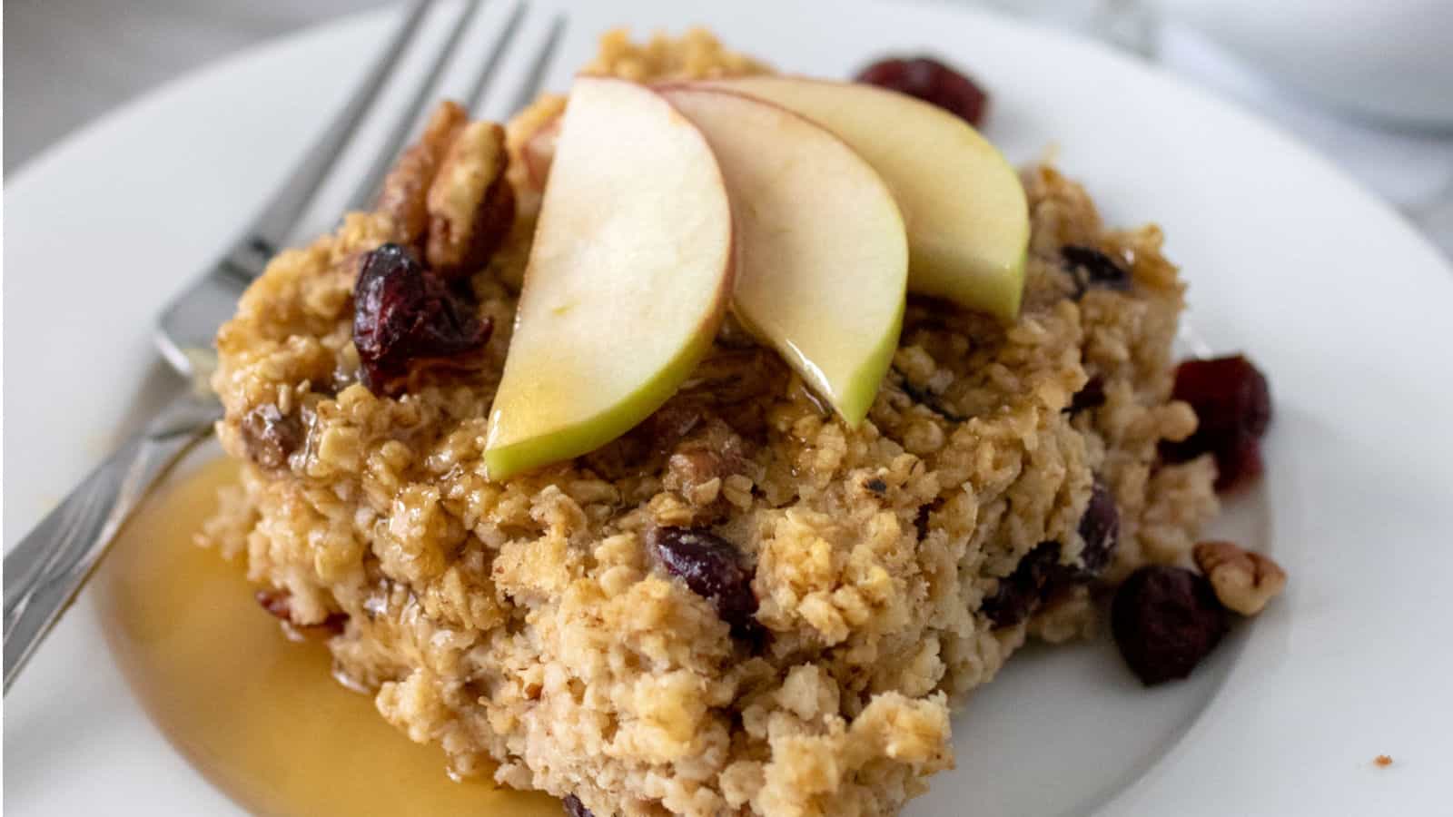 Baked oatmeal with sliced apples on top.