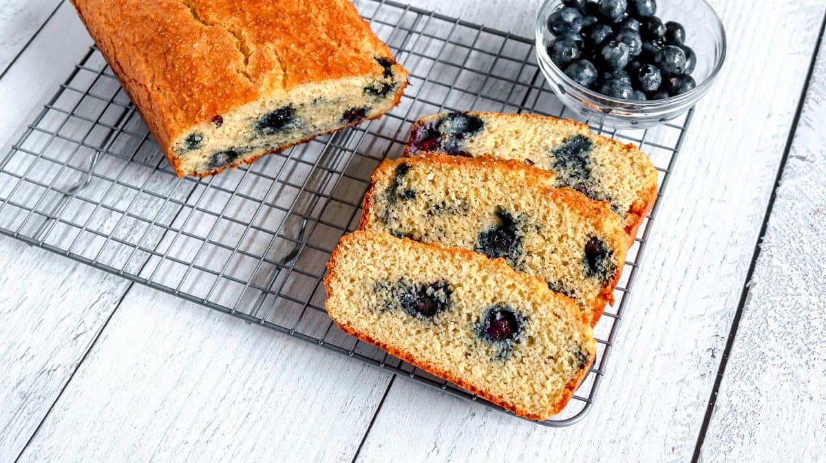 Blueberry bread on a cooling rack.