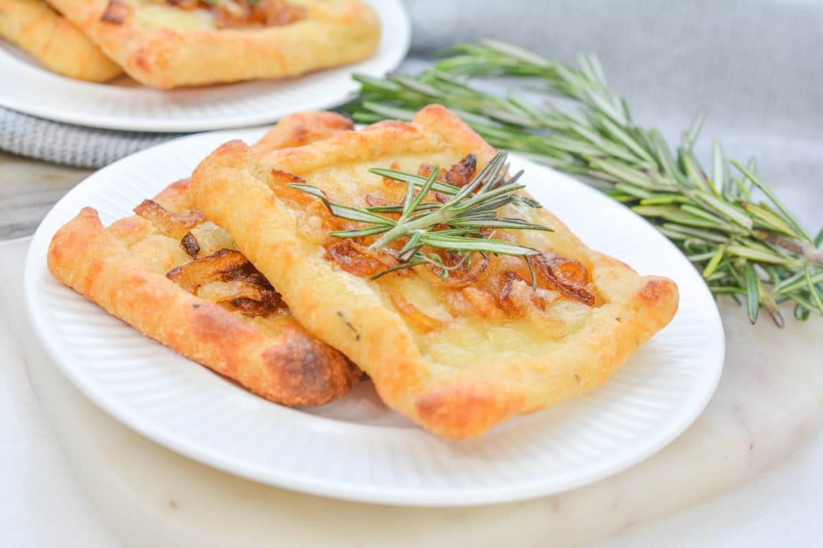 A plate Caramelized Onion and Brie Tart.