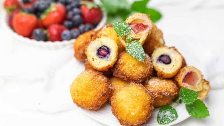 A plate with fruit and berries on it.