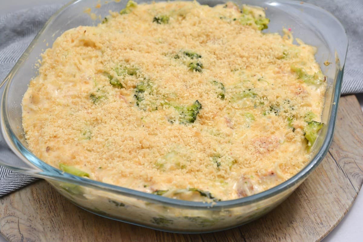 A casserole dish filled with chicken and broccoli.