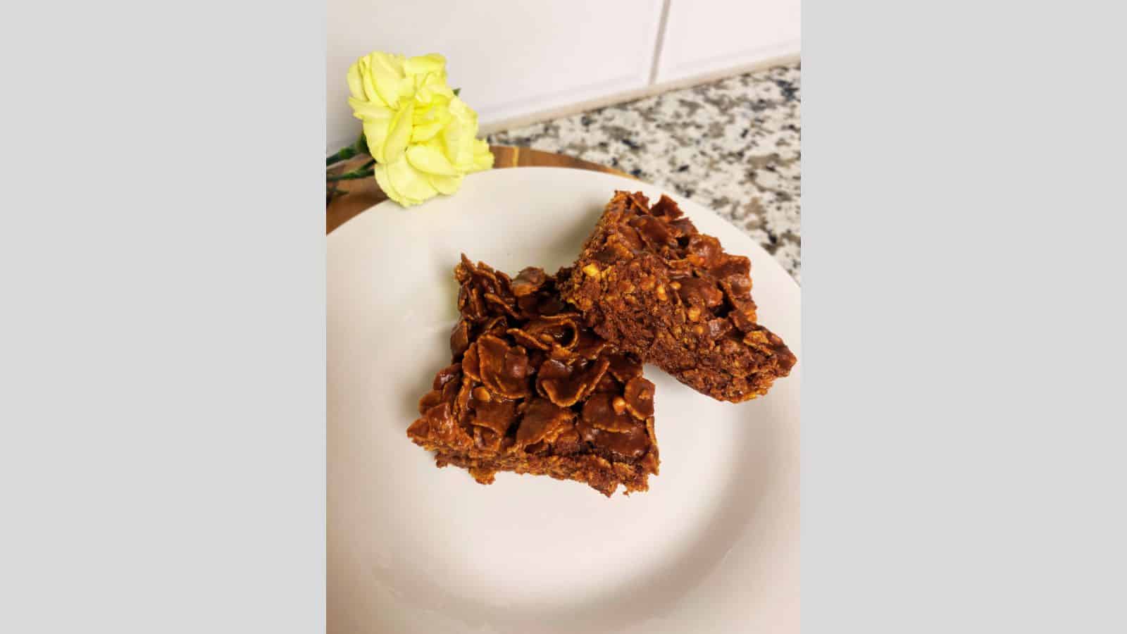 Corn Flake cookies on white plate.