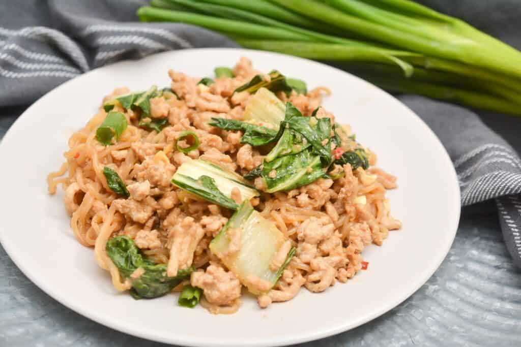 A plate of keto noodles with meat and vegetables.