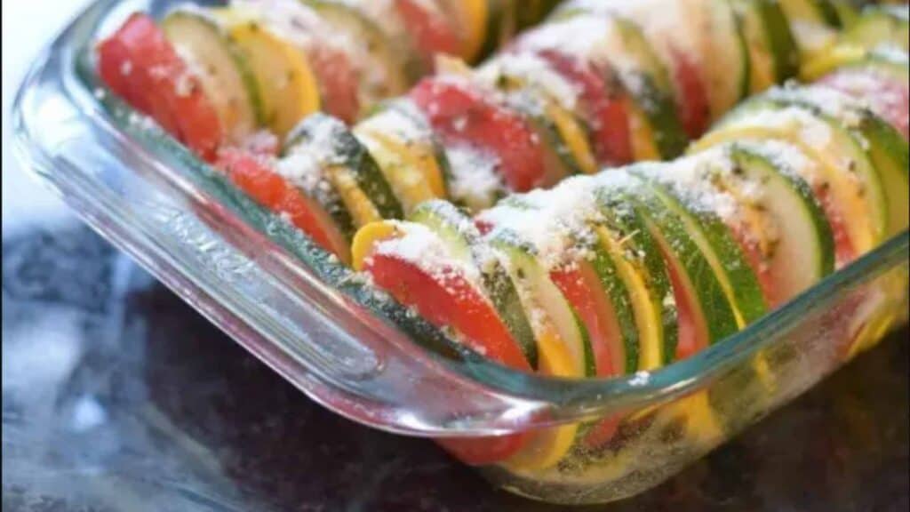 Italian ratatouille in a glass casserole dish.