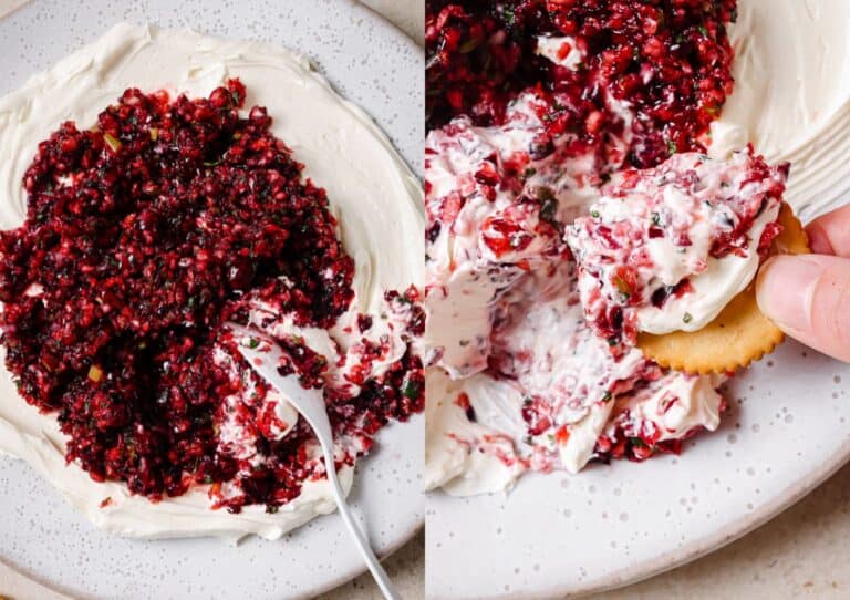 A person is dipping a cracker into a bowl of cranberry cream cheese.