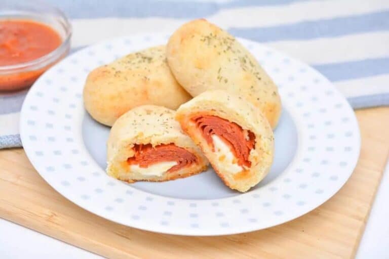 Pepperoni rolls on a plate.