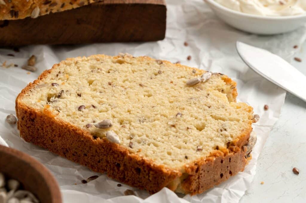 Seed bread on a white napkin.