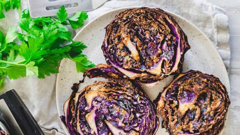 Sliced cabbage on a plate with parsley.