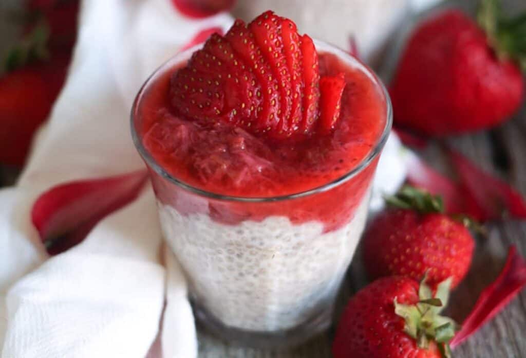 Chia pudding with strawberries in a glass.