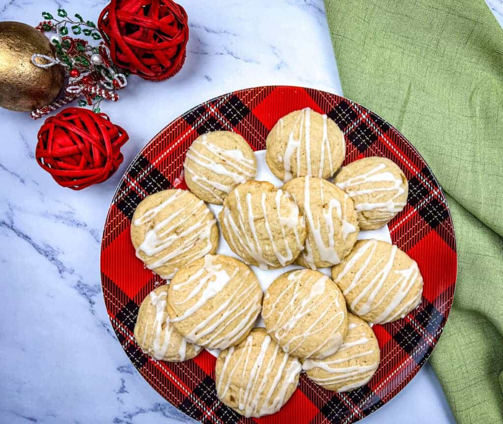 A plate of eggnog cookies with spiced rum glaze on top.