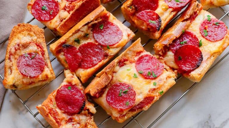 Pepperoni pizza on a cooling rack.