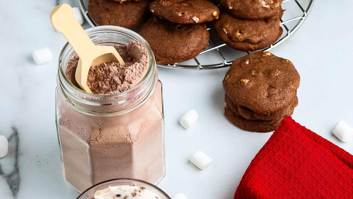 Mason jar with hot cocoa mix.