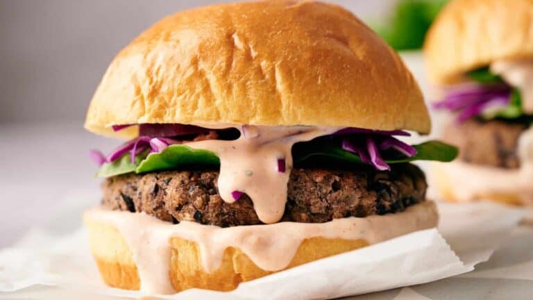 Spicy black bean burgers with red cabbage slaw.