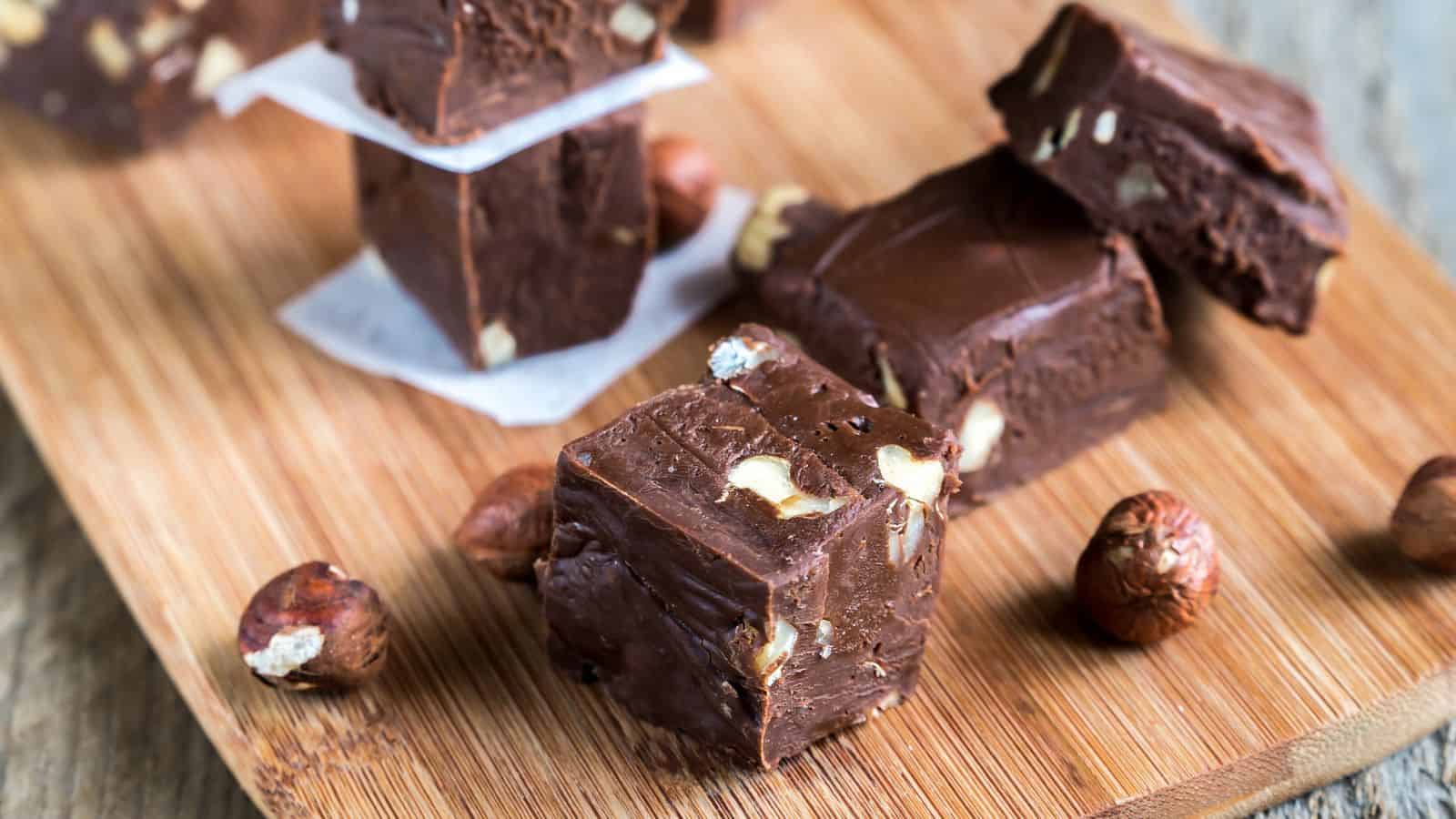 A picture of Nutella fudge bites on wooden cutting board.