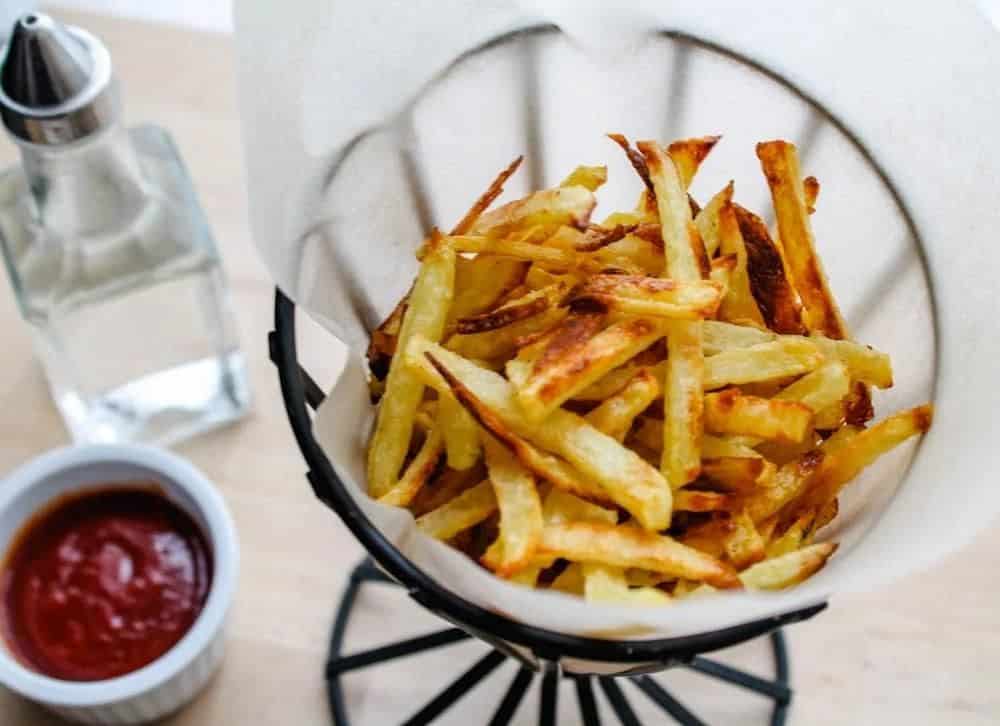 A dish of oven baked french fries.